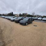 Photo extérieure de BYmyCAR avec les voitures garées sur le terrain